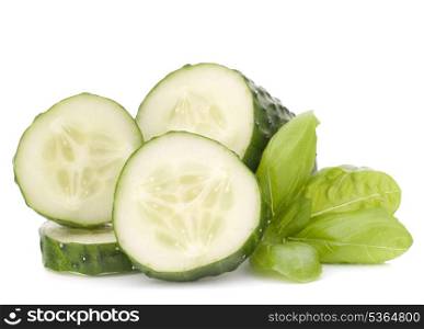 Sliced cucumber vegetable and basil leaves still life isolated on white background cutout