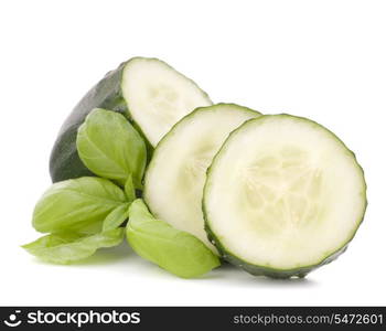 Sliced cucumber vegetable and basil leaves still life isolated on white background cutout