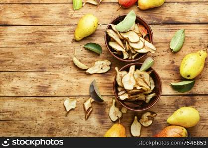 Sliced dried pear pieces.Dried pear or pear chips.Copy space. Dry pear fruit