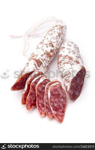 Sliced dry salami, isolated on white background