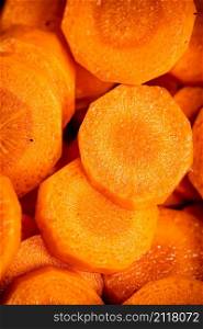 Sliced fresh carrots. Macro background. Carrot texture. High quality photo. Sliced fresh carrots. Macro background.