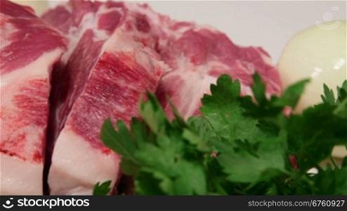 Sliced fresh pork meat for roasting close-up dolly shot