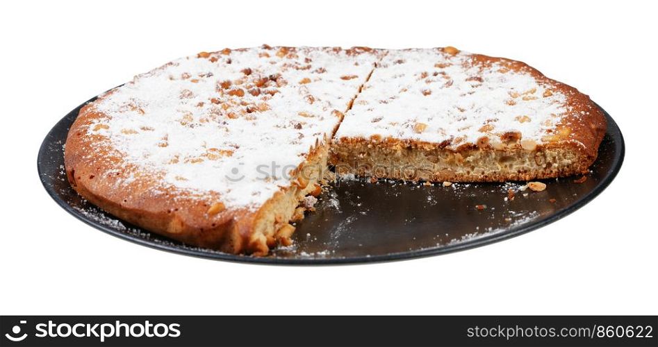 sliced Italian Pine Nut Cake on black plate isolated on white background