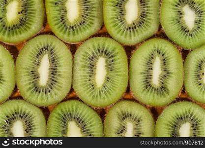 Sliced kiwi laid out in pattern