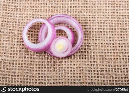 Sliced onion rings and  onion slices  on the background