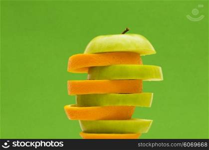 Sliced orange and apple isolated