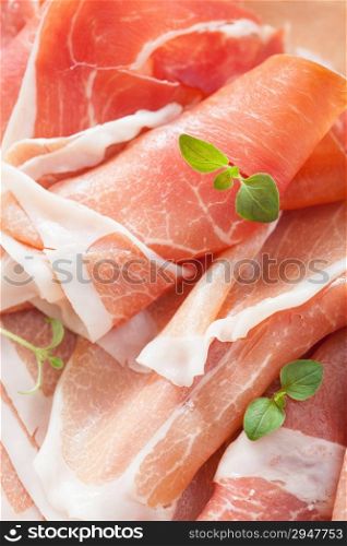 sliced prosciutto ham closeup