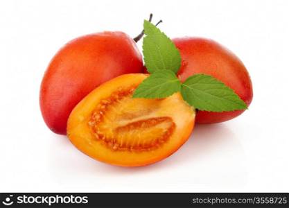 Sliced ripe Tamarillo fruits isolated on white background