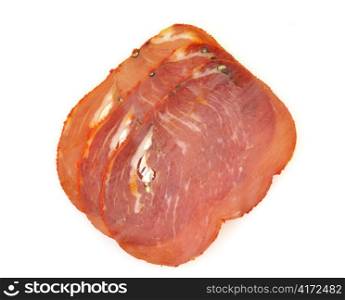sliced smoked meat , close up on white background