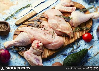 Sliced uncooked chicken meat and ingredients. Raw chicken meat.. Raw, fresh chicken meat.