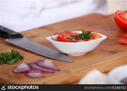 sliced vegetables and knife