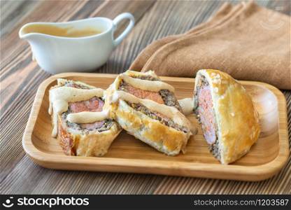 Slices of beef Wellington on a plate