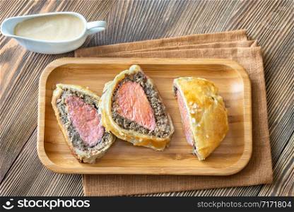 Slices of beef Wellington on a plate