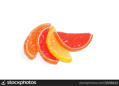 slices of fruit in sugar isolated on a white background