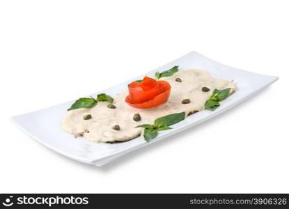slices of ham with sauce on the plate isolated on white