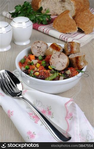 Slices of homemade sausages with vegetables