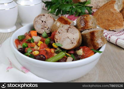 Slices of homemade sausages with vegetables