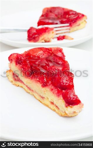 Slices of Homemade Strawberry Pie With Jelly on White Plate