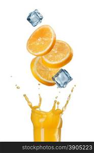 slices of orange falling into juice splash in glass isolated on white