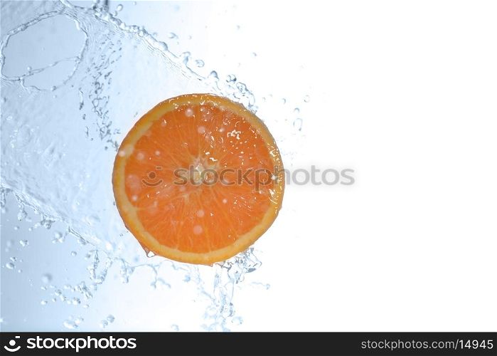 slices of orange in water with bubbles&#xA;