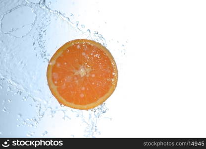 slices of orange in water with bubbles&#xA;