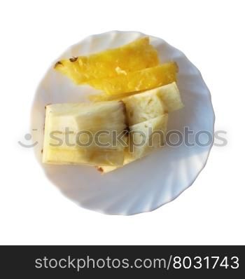 Slices of pineapple . Slices of pineapple on a white plate