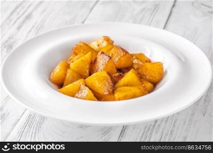 Slices of roasted caramelized pineapple with cinnamon