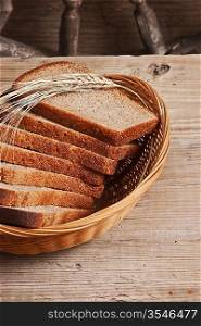 slices of rye bread and ears of corn in the basket