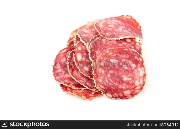 Slices of salami sausages isolated on a white background