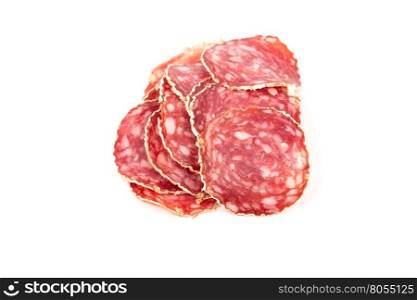 Slices of salami sausages isolated on a white background