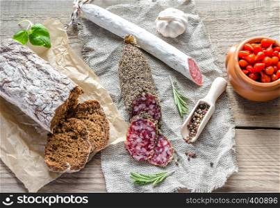 Slices of spanish salami on the sackcloth