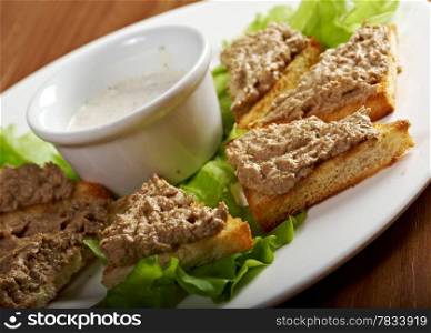 Slices of toasted bread with delicious liver pate
