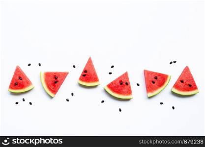 Slices of watermelon with seeds isolated on white background, top view