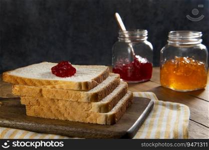 Slices of White bread with strawberry jam