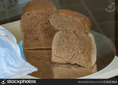 slices of wholemeal black bread in the basket