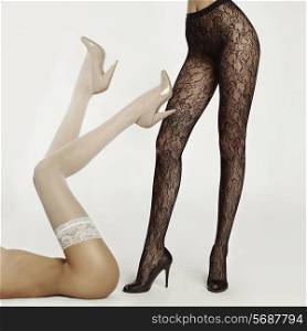 Slim female legs in pantyhose. Conceptual fashion art photo