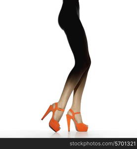 Slim female legs in red shoes isolated on white. Conceptual fashion art photo