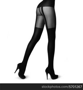 Slim female legs in stockings isolated on white. Conceptual fashion art photo