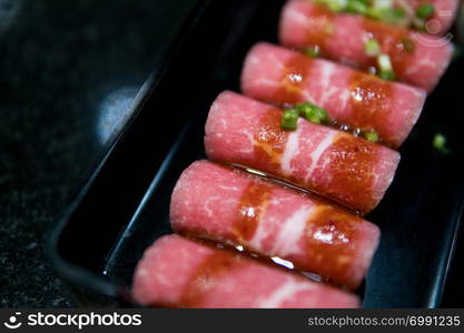 slim slices of raw meat