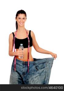 Slim woman back with huge pants and water bottle isolated on white background