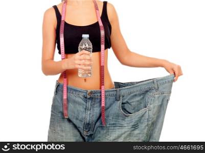 Slim woman back with huge pants and water bottle isolated on white background
