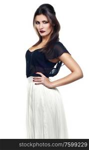 slim woman in white skirt and black top on white background