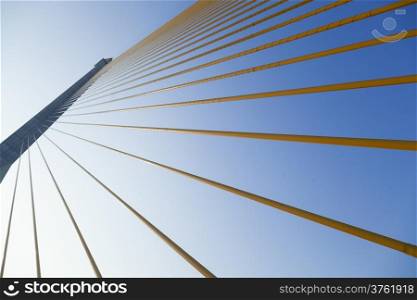 Slings is the structure of the bridge. Slings arranged in a row above the bridge.