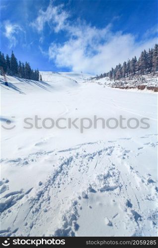 Slope on the skiing resort in Carpathians. Ukraine. WInter Landscape