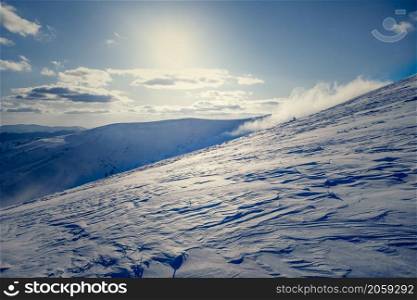 Slope on the skiing resort in Carpathians. Ukraine. Winter landscape