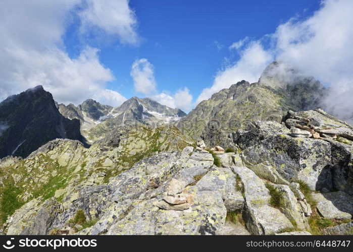 slopes and peaks of mountains and blue sky landscape