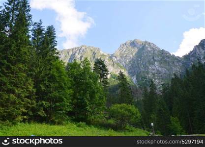 slopes of mountains and blue sky landscape