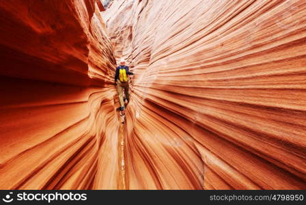 Slot canyon in Grand Staircase Escalante National park, Utah, USA. Unusual colorful sandstone formations in deserts of Utah are popular destination for hikers.