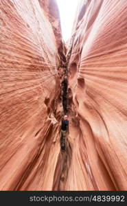 Slot canyon in Grand Staircase Escalante National park, Utah, USA. Unusual colorful sandstone formations in deserts of Utah are popular destination for hikers.