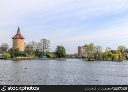 Slottsparken park pond and old tower panorama, Malmo, Sweden
